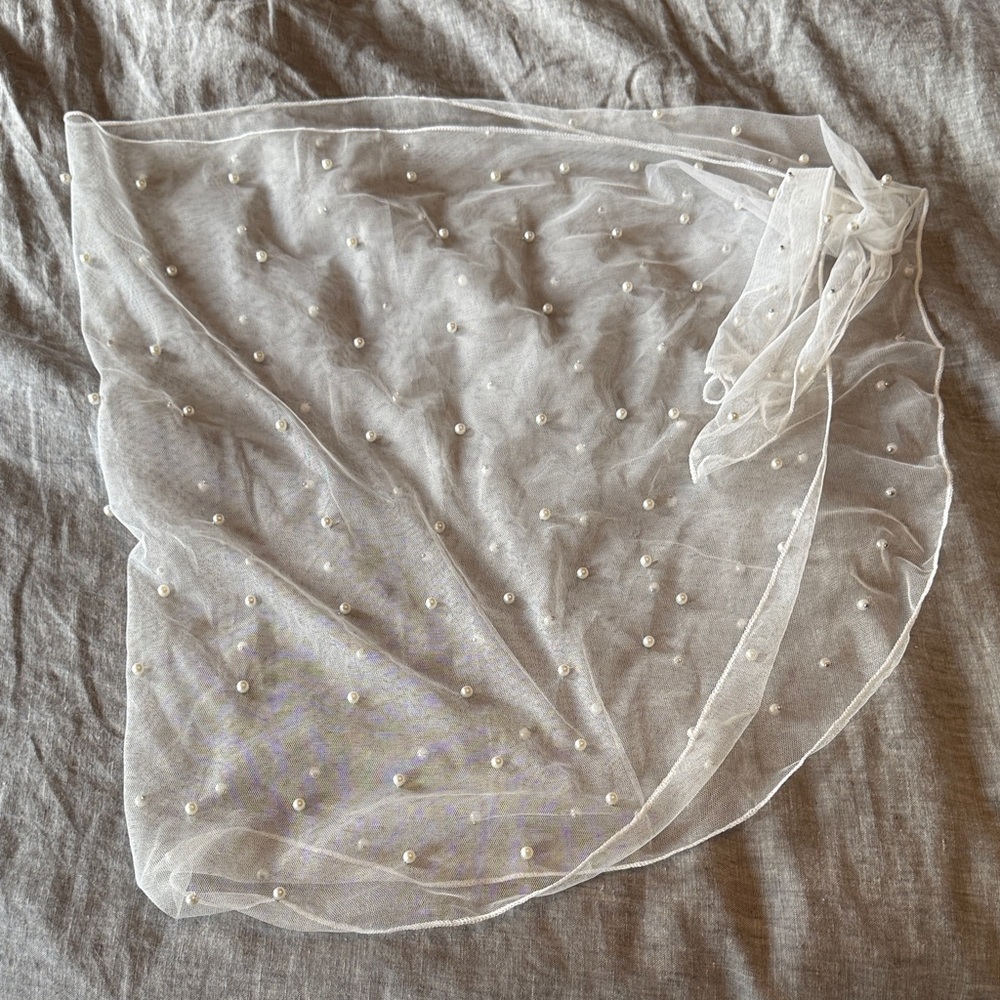 Sheer white bathing suit skirt coverup